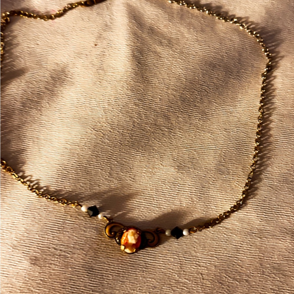Elegant Gold and Black Necklace
